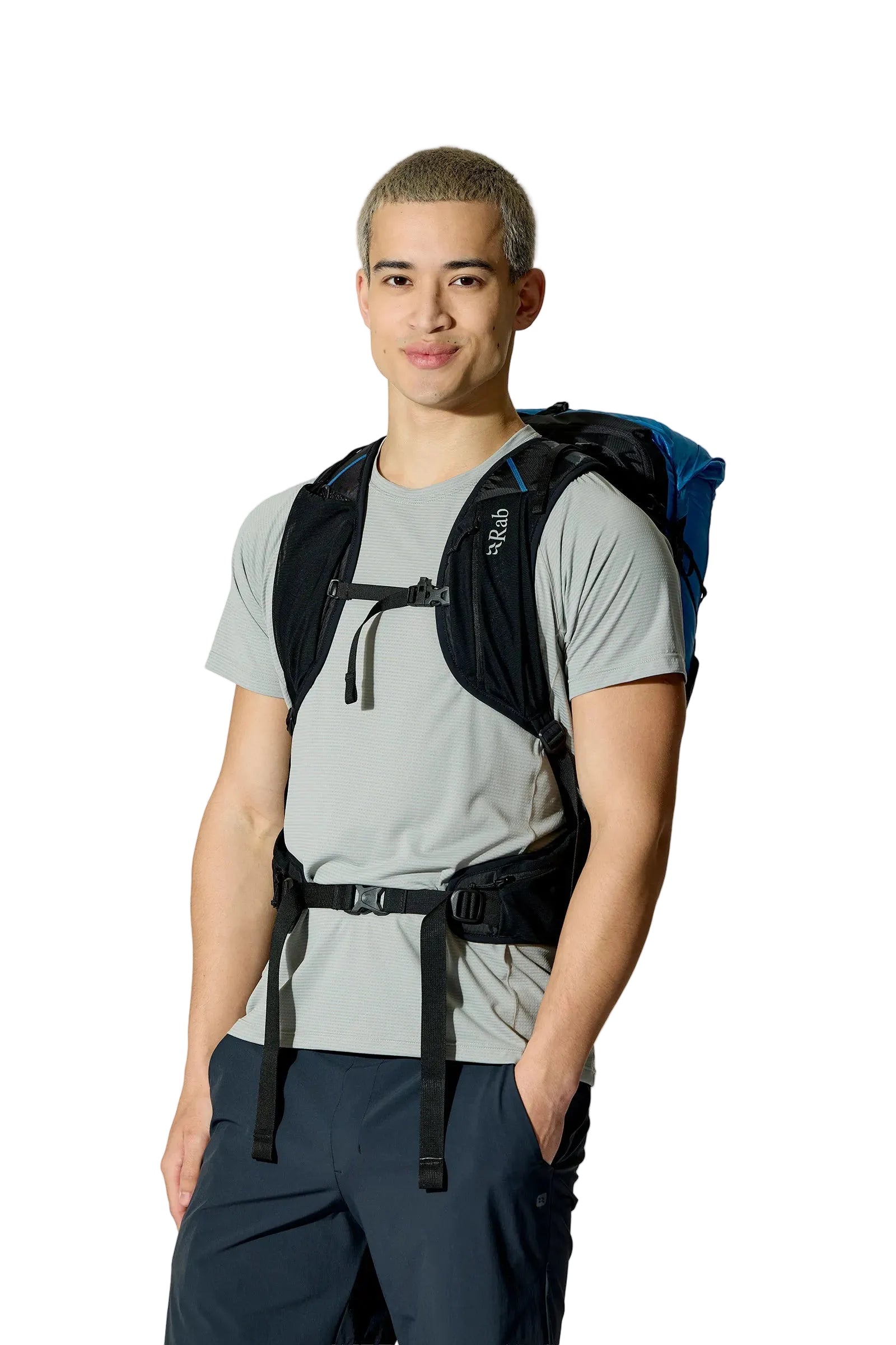 Rab Syclon XP 30L Waterproof Pack in Black/Maya Blue - Three Quarter View On Model