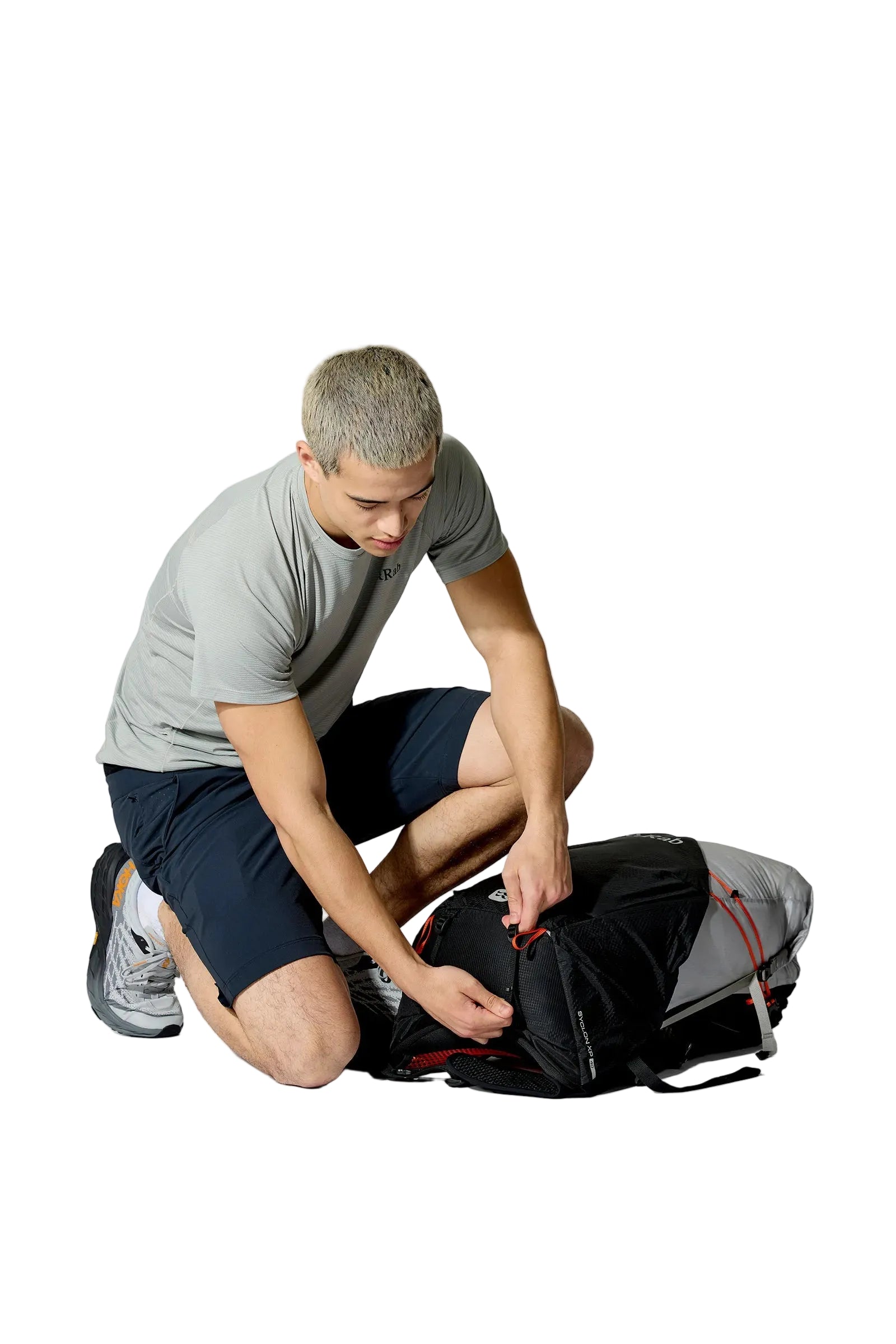 Rab Syclon XP 40L Waterproof Pack in Black/Dark Pewter - Seated View On Model 2
