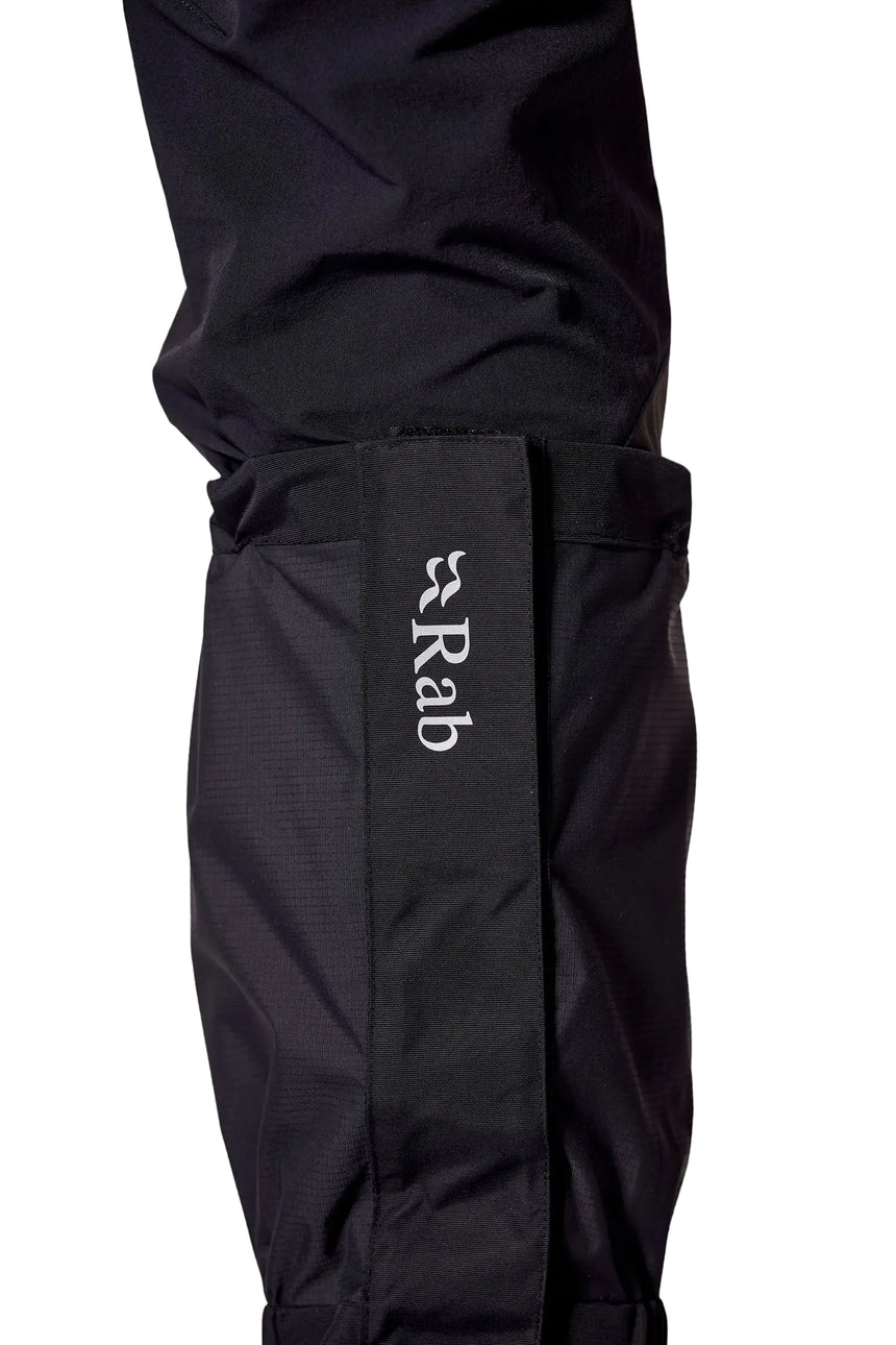 Rab Trek Gaiter in Black - worn, side/logo detail