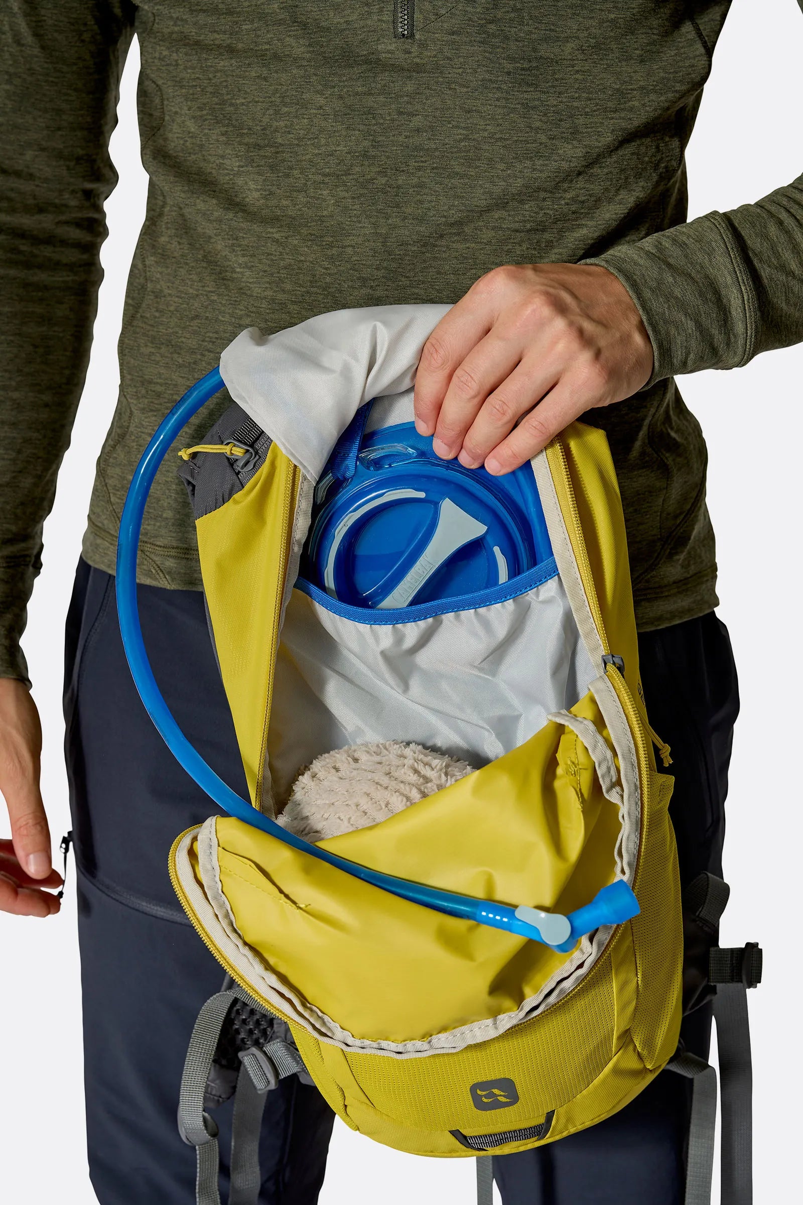 Rab Tygen 12L Day Pack in Dark Pollen - Hydration Compartment Open