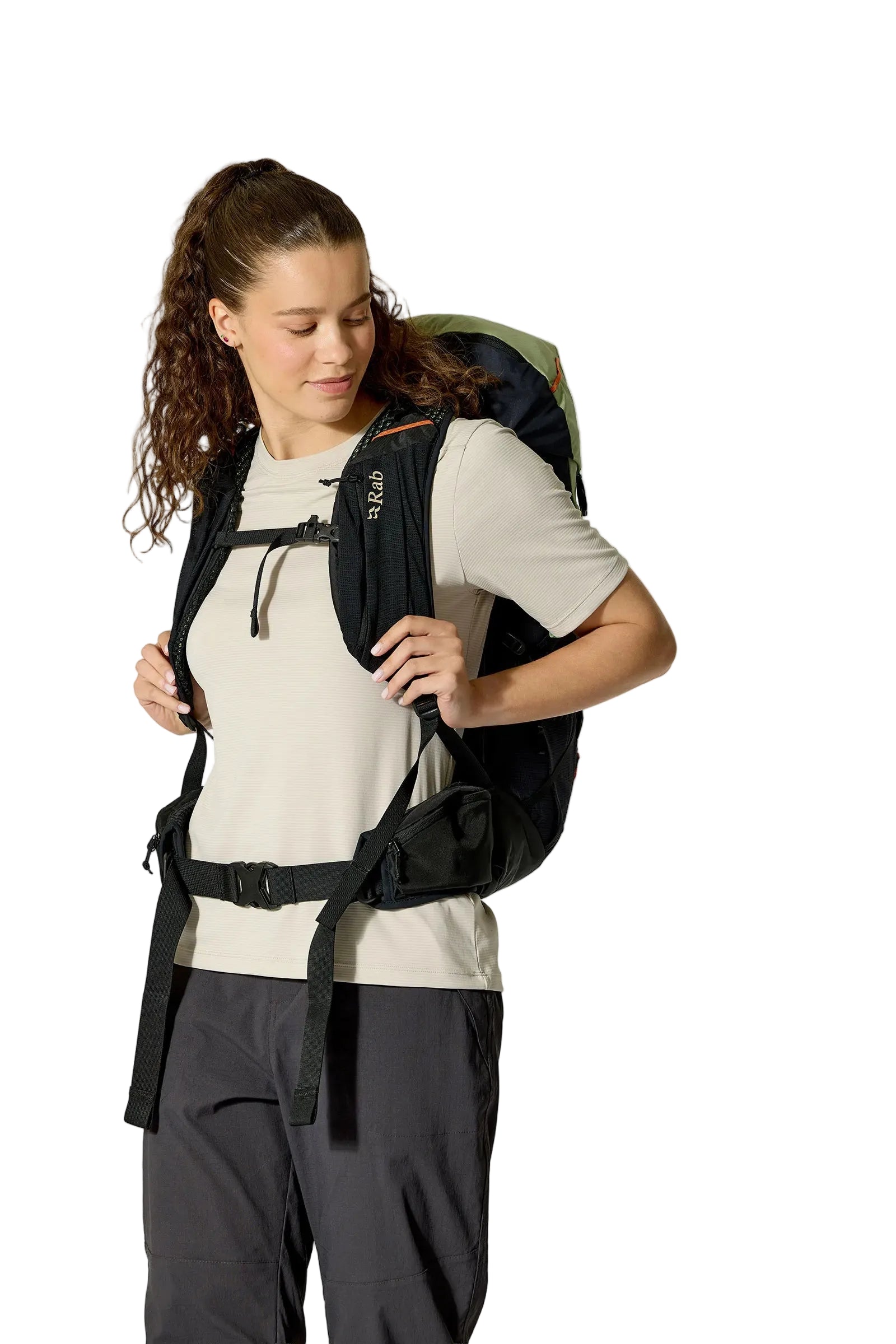 Rab Women's Airox ND 28 Day Pack in Fig Green/Black - Seated View On Model