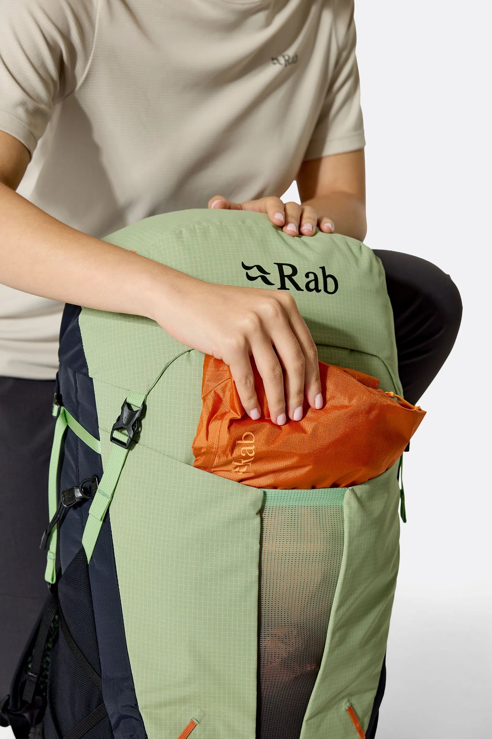 Rab Women's Airox ND 28 Day Pack in Fig Green/Black - Side View On Model 3
