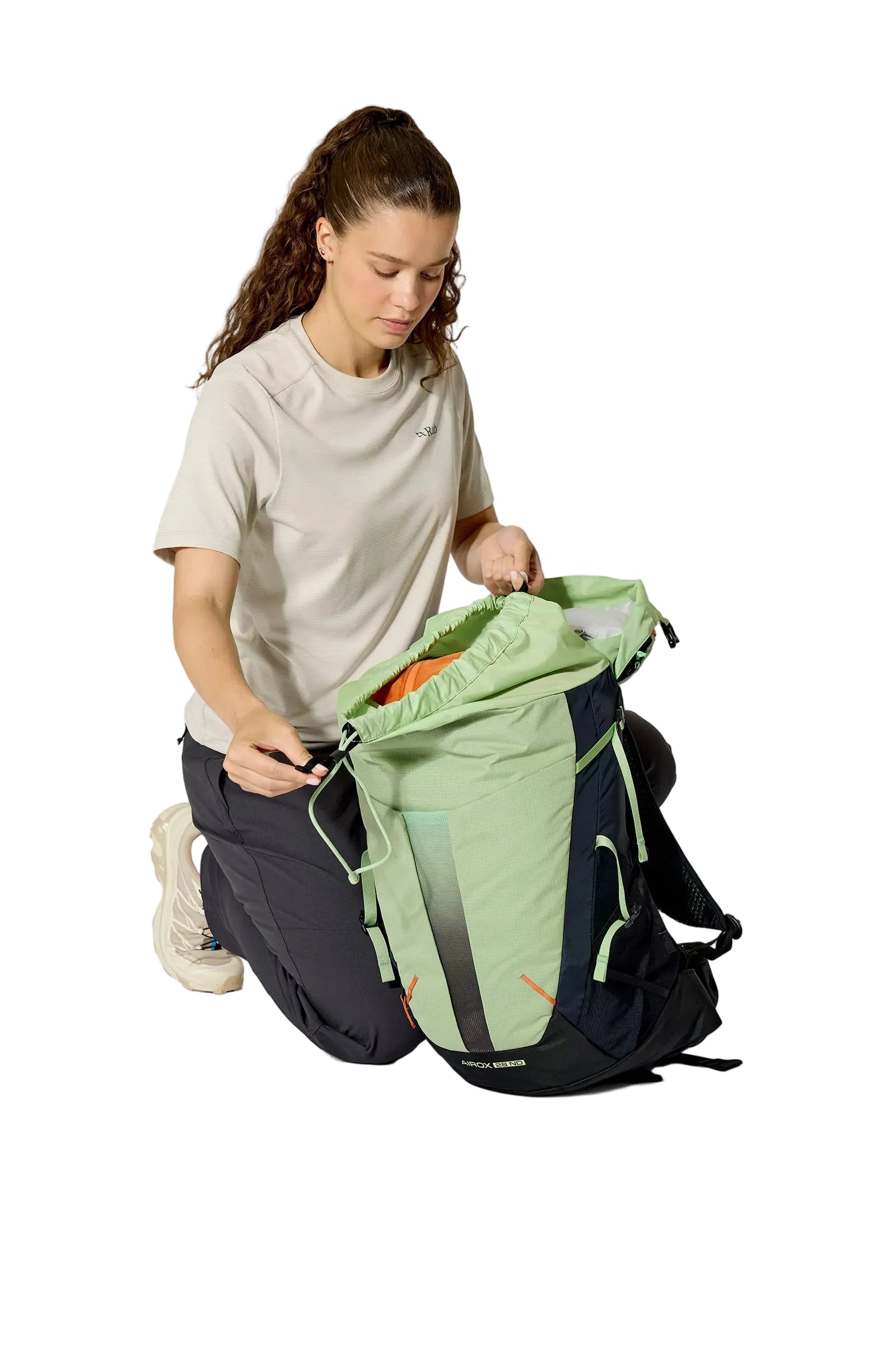 Rab Women's Airox ND 28 Day Pack in Fig Green/Black - Side View On Model 4