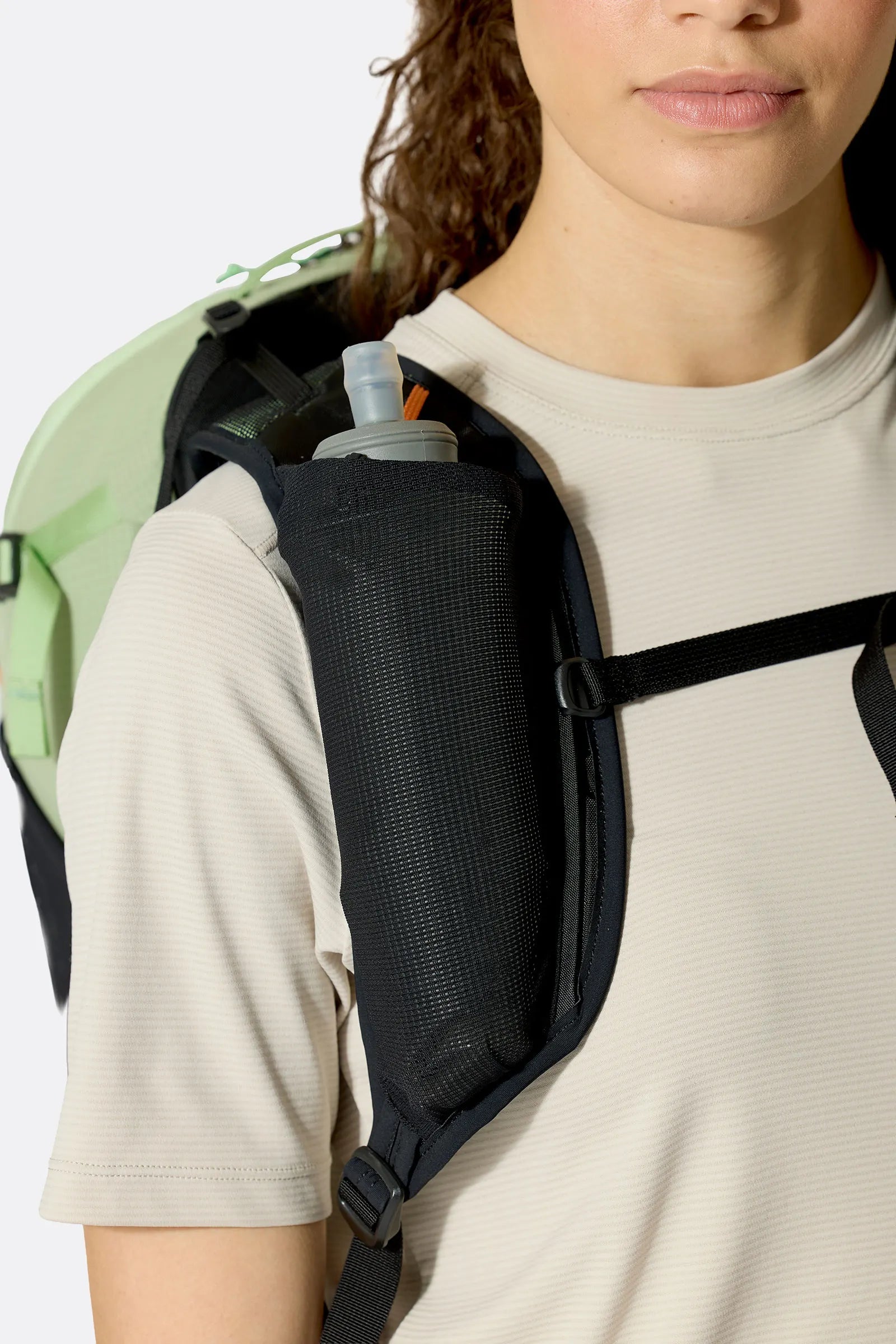 Rab Women's Airox ND22L Day Pack in Fig Green/Black - On Model Chest Pocket Access
