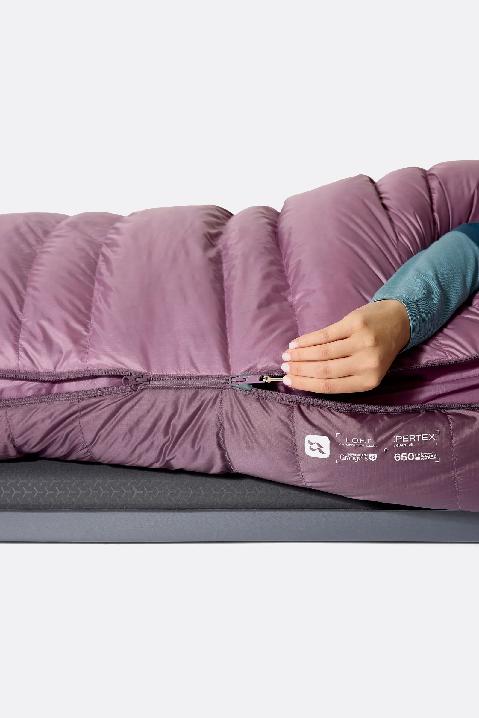 Rab Women's Alpine Down Sleeping Bag (-18°C/0F) in Iris/Dark Iris - worn, hand out of zip