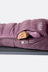 Rab Women's Alpine Down Sleeping Bag (-6°C/21F) in Iris/Dark Iris - Model Lying Wrapped