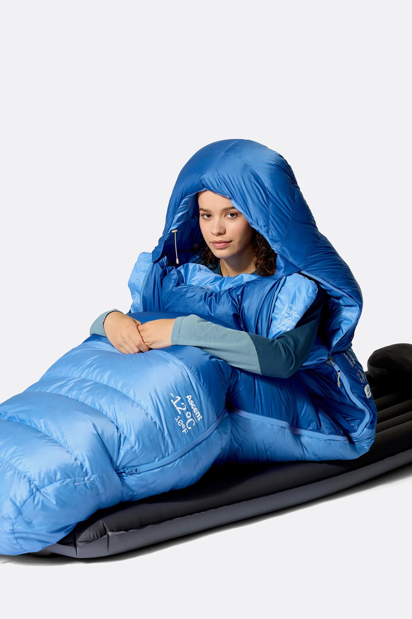 Rab Women's Ascent Down Sleeping Bag (-12°C/10F) in Dark Bluebird/Birdbird - Model Lying Left