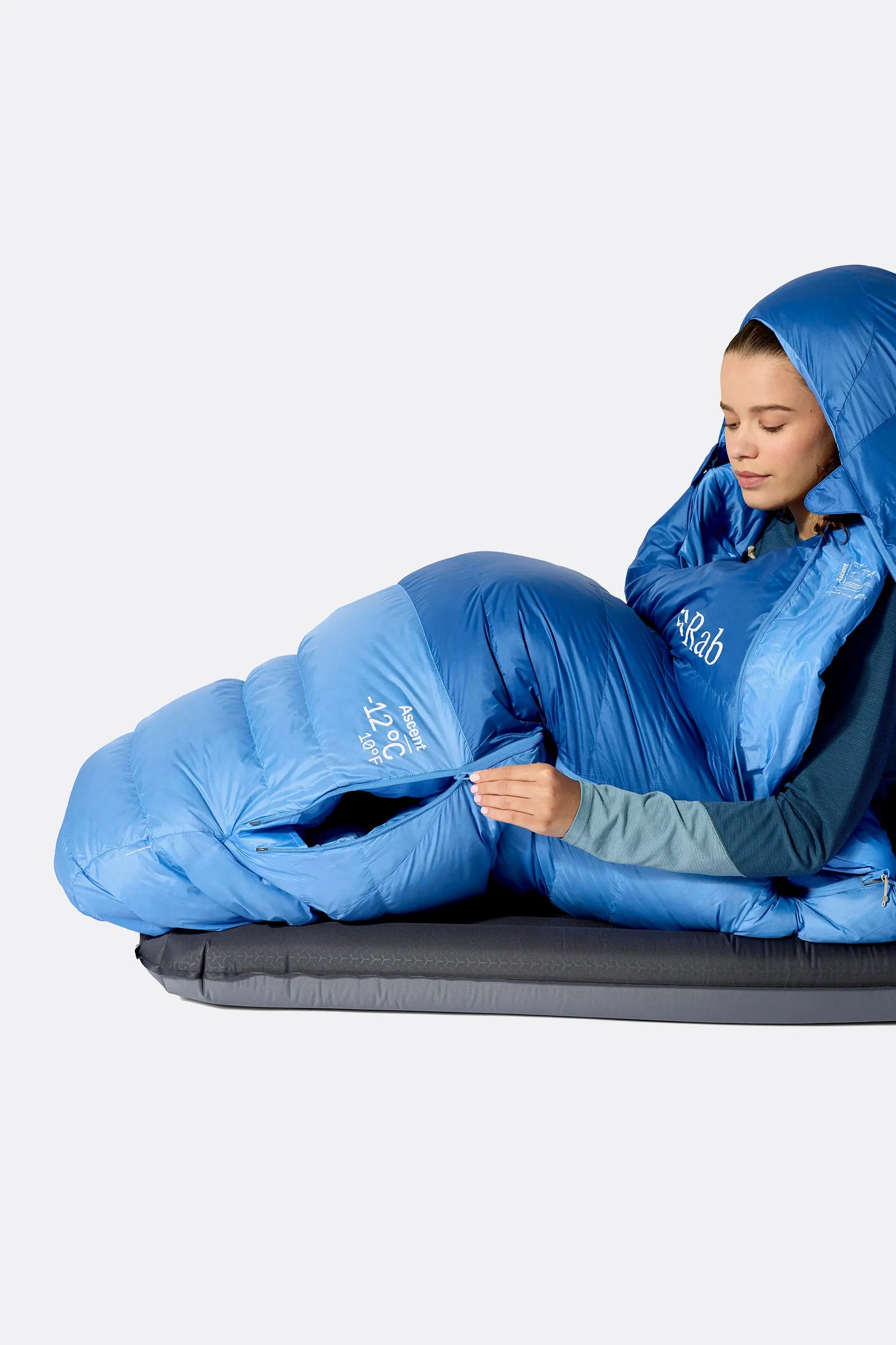 Rab Women's Ascent Down Sleeping Bag (-12°C/10F) in Dark Bluebird/Birdbird - Model Lying Side