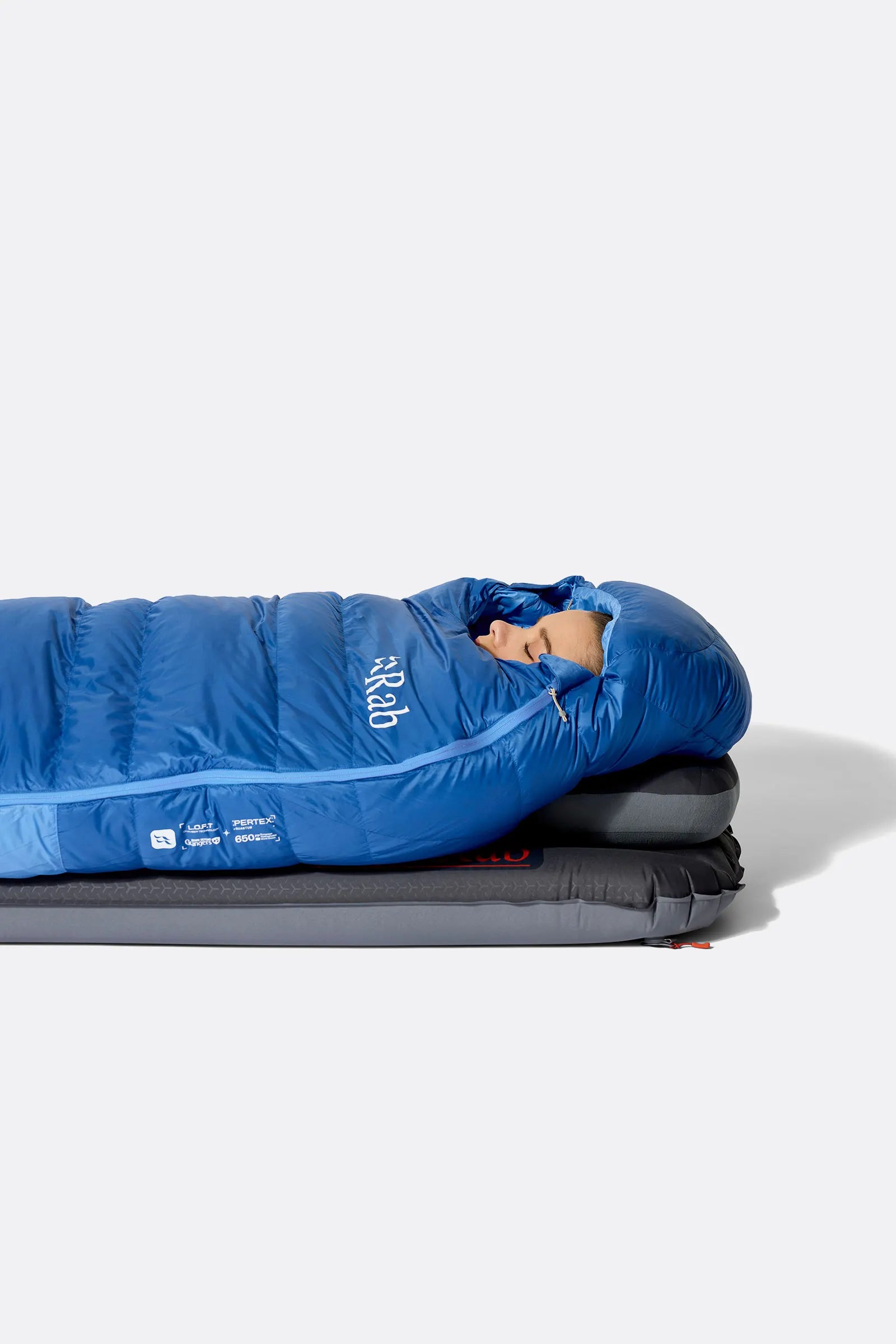 Rab Women's Ascent Down Sleeping Bag (-12°C/10F) in Dark Bluebird/Birdbird - Model Lying Top