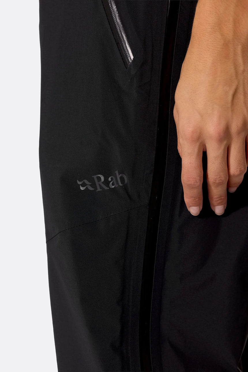 Rab Women's Firewall Guide Waterproof Pants in Black - side seam detail on model
