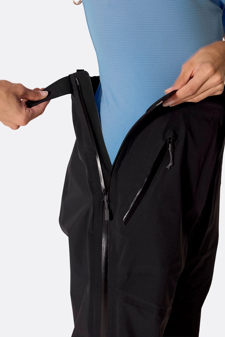 Rab Women's Firewall Guide Waterproof Pants in Black - waist adjustment detail on model