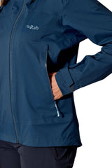 Rab Women's Firewall Light Waterproof Jacket in Tempest Blue - hand pocket detail, worn