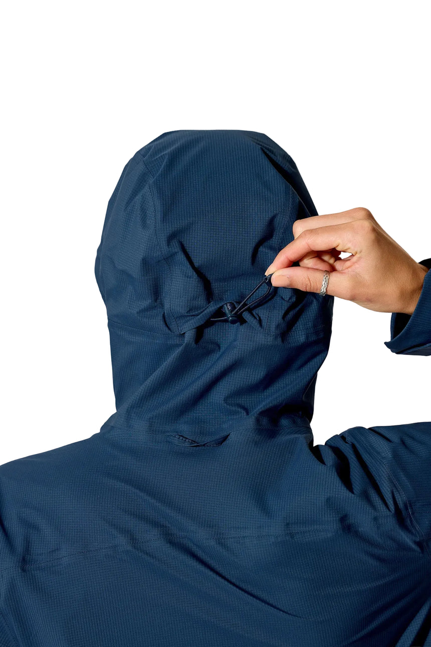 Rab Women's Firewall Light Waterproof Jacket in Tempest Blue - hood cinch detail, worn