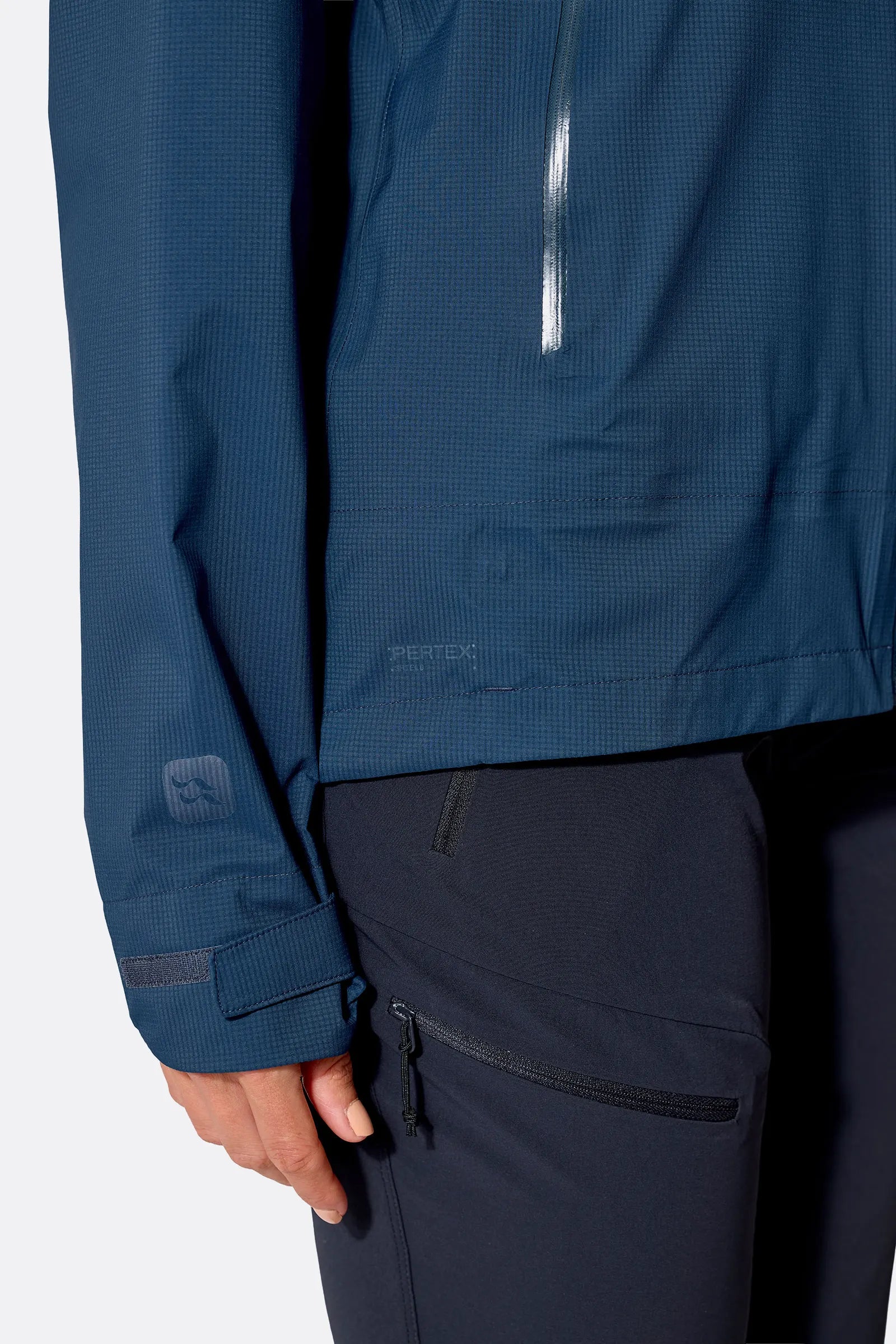 Rab Women's Firewall Light Waterproof Jacket in Tempest Blue - sleeve detail, worn