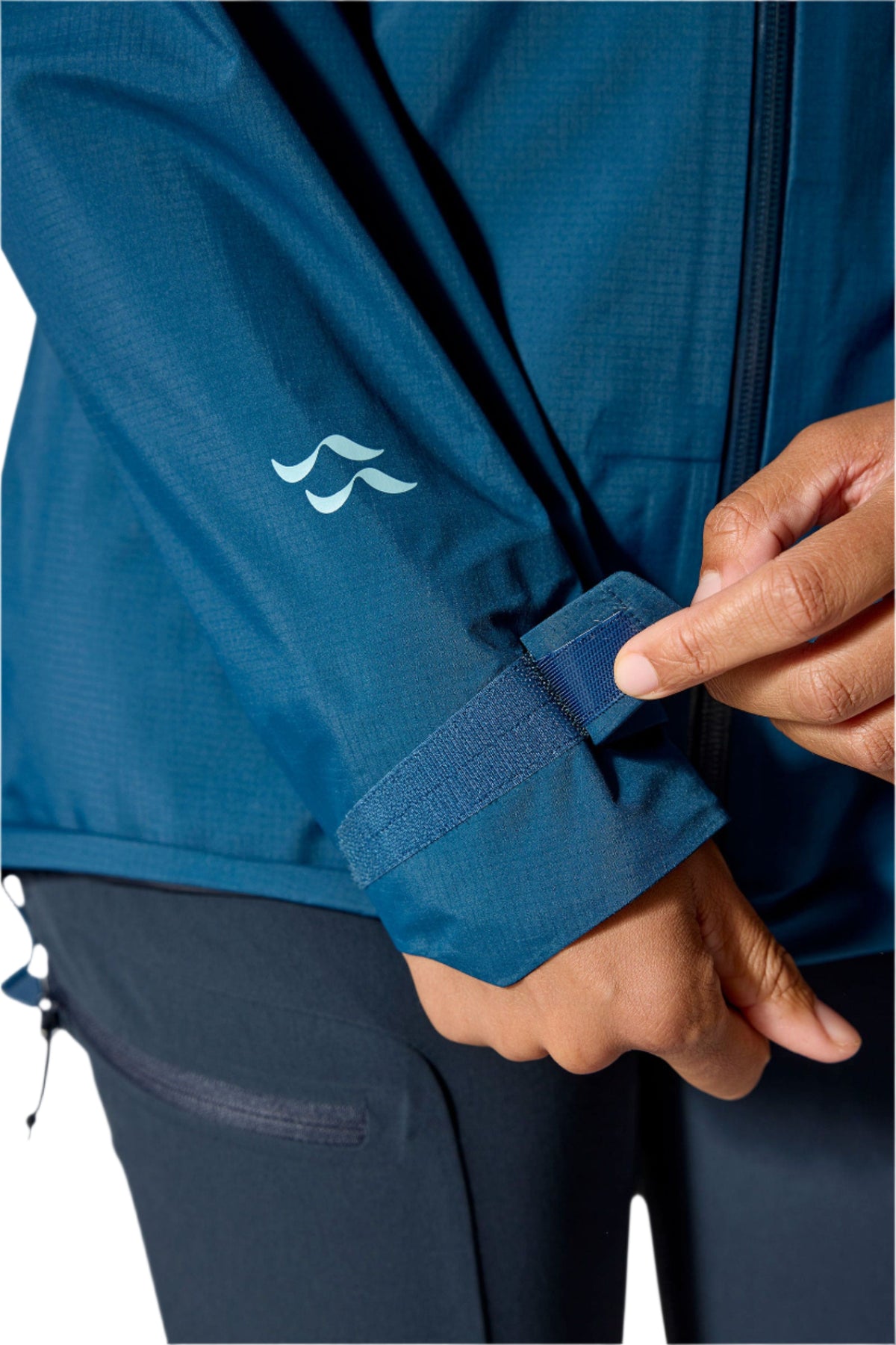 Rab Women's Firewall Mountain Waterproof Jacket in Tempest Blue - cuff detail, worn