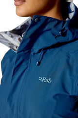 Rab Women's Firewall Waterproof Jacket in Tempest Blue - collar detail on model