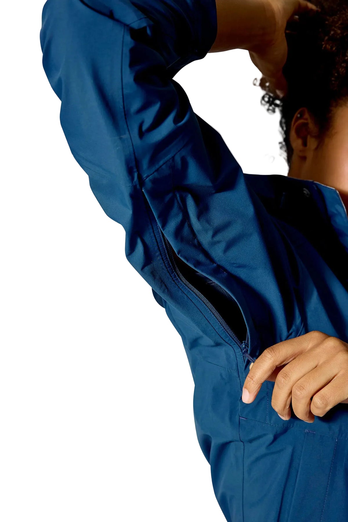 Rab Women's Firewall Waterproof Jacket in Tempest Blue - underarm vent detail on model
