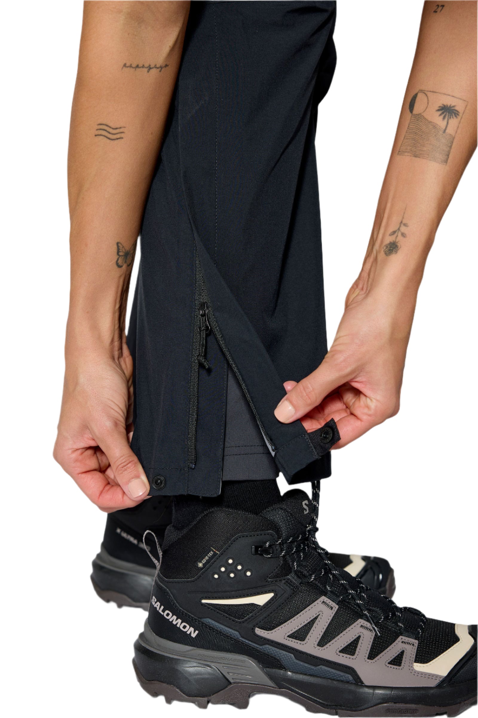 Rab Women's Firewall Waterproof Pants in Black - waistband adjustment detail, worn