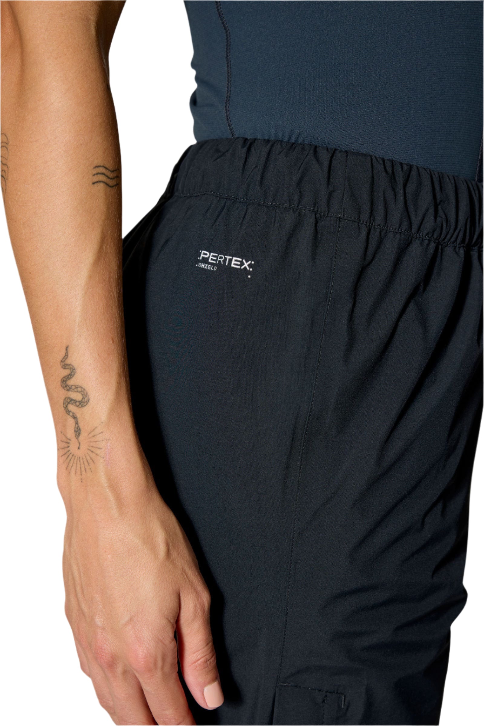 Rab Women's Firewall Waterproof Pants in Black - hem detail, worn