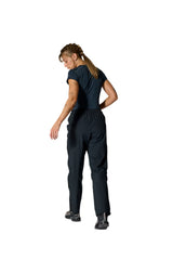 Rab Women's Firewall Waterproof Pants in Black - worn, back, three-quarter