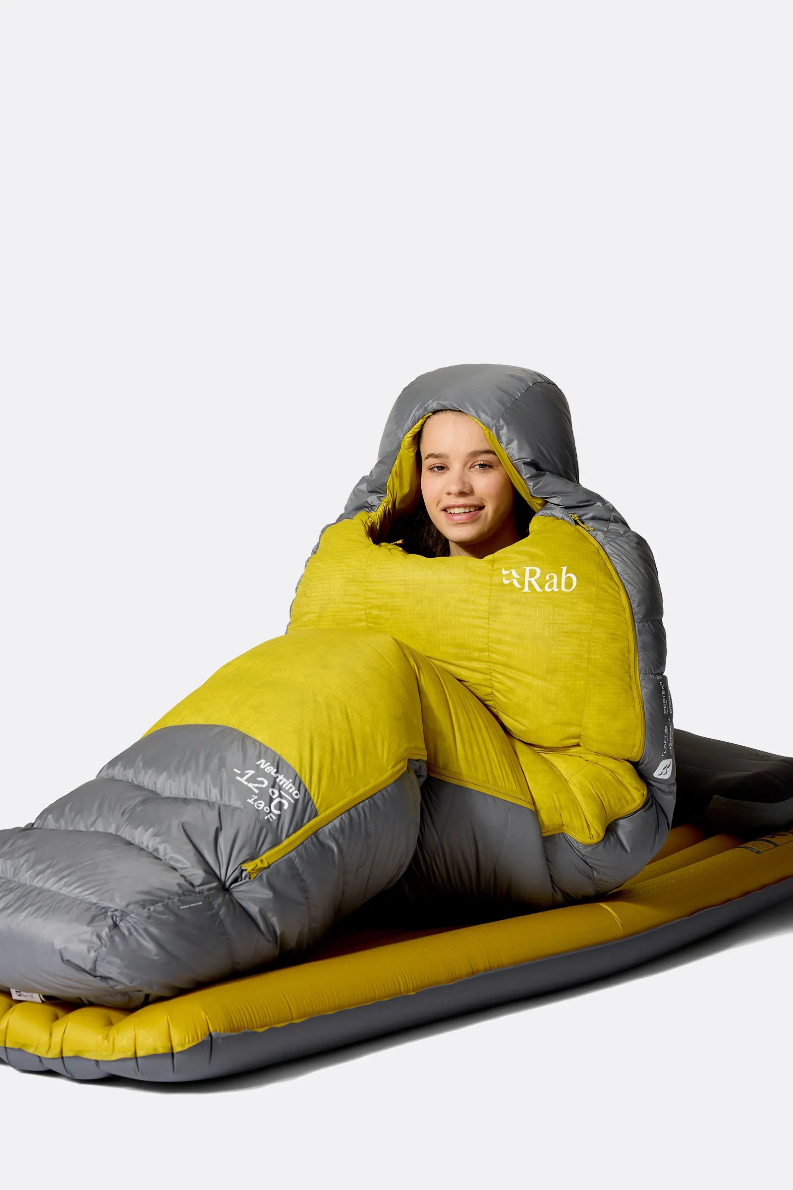 Rab Women's Neutrino Down Sleeping Bag (-6°C/20F) in Zinc/Dark Pollen - Model In Use Front