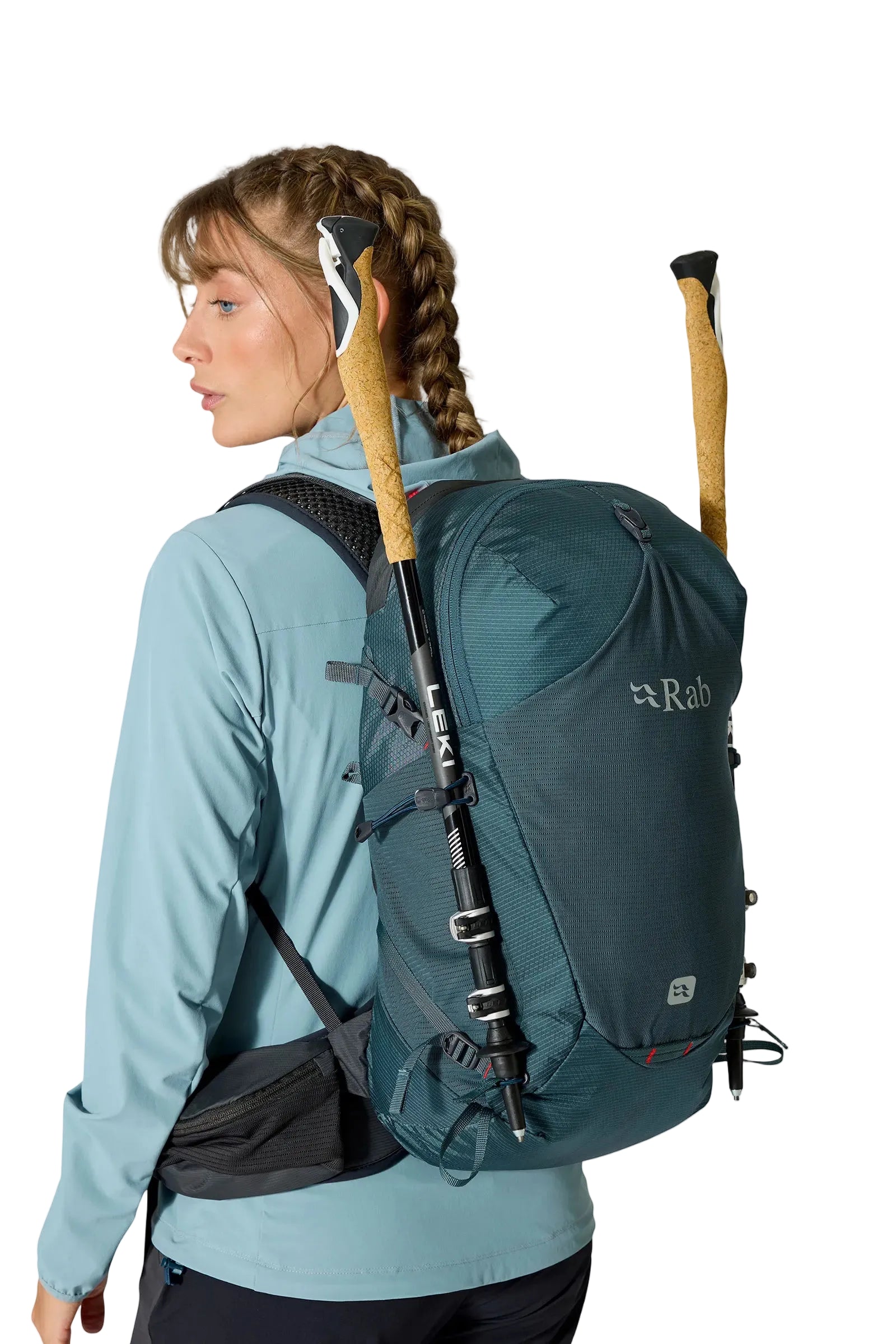 Rab Women's Protium ND18L Day Pack in Orion Blue - On Model Side View with Walking Pole