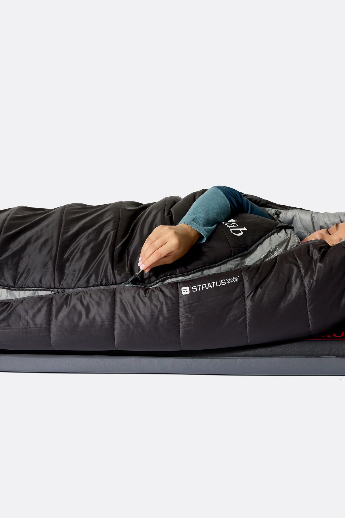 Rab Women's Radeon Synthetic Sleeping Bag (0°C/32F) in Dark Fig Green/Graphene - worn, side sleeping