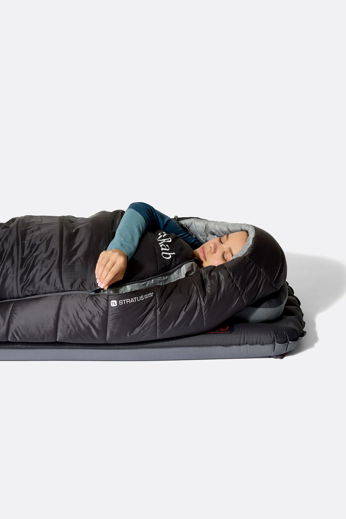 Rab Women's Radeon Synthetic Sleeping Bag (-6°C/20F) in Dark Fig Green/Graphene - worn, side sleeping close-up