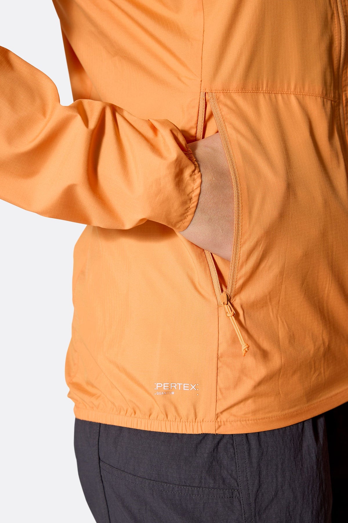 Rab Women's Windgather Hooded Jacket in Orange - pocket detail worn
