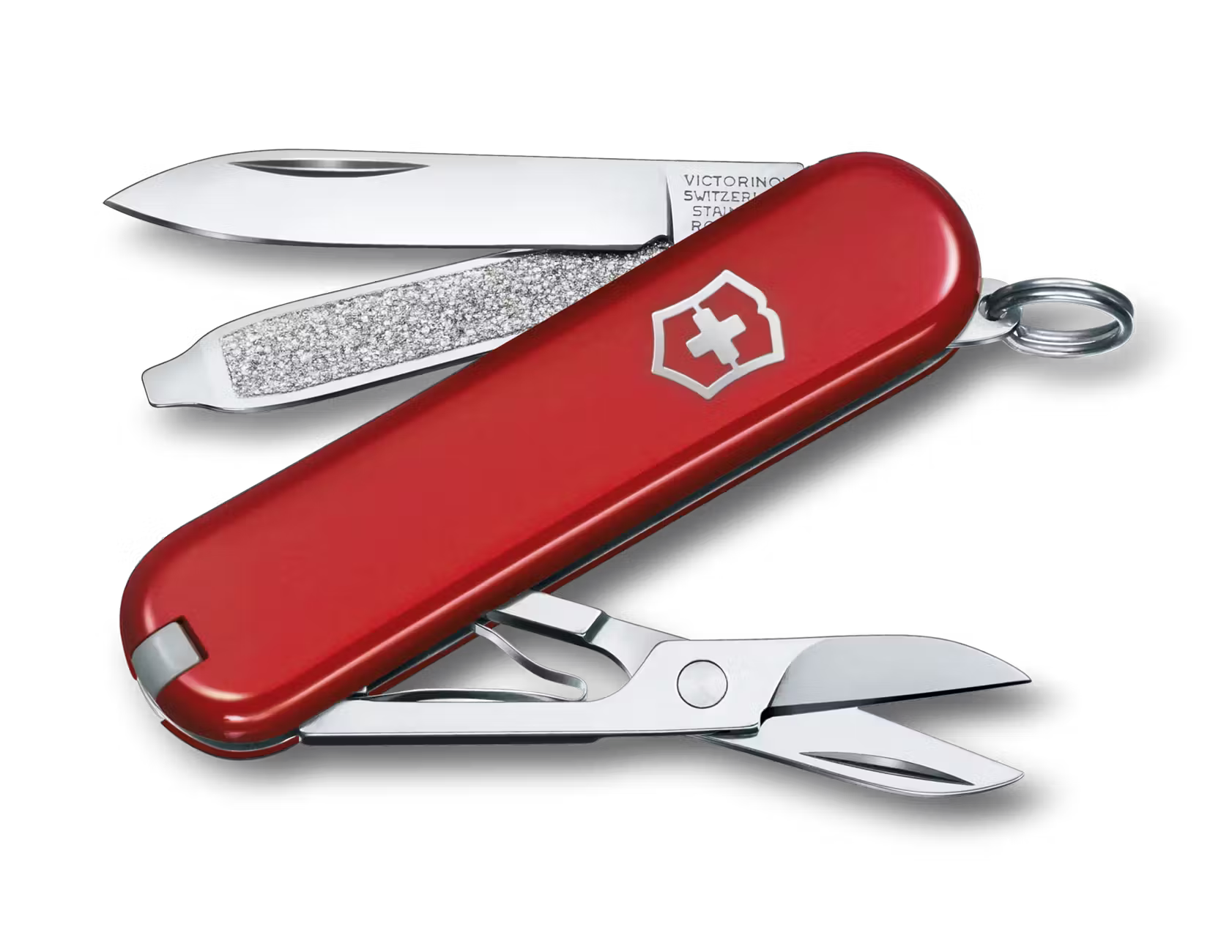 Red Swiss Army knife with open tools on a white background