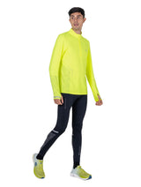 Ronhill Men's Tech Reflect 1/2 Zip in Fluo Zest/Reflect - Studio Side Walking