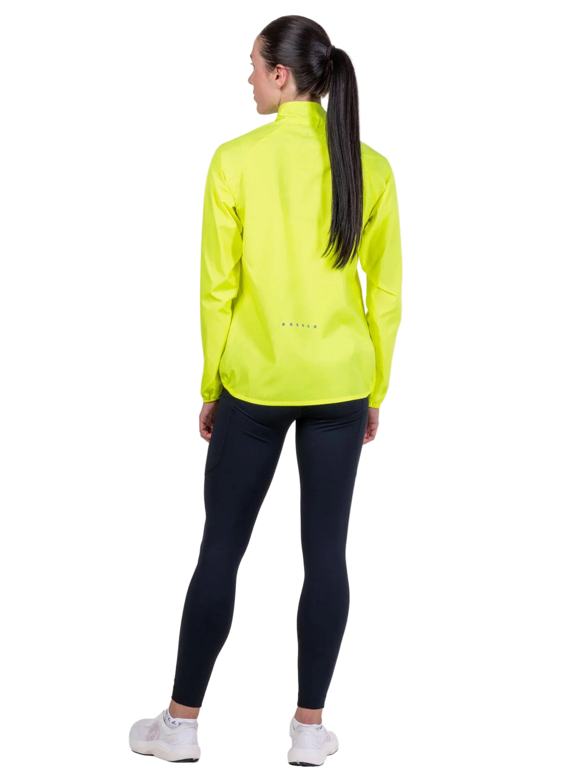 Ronhill Women's Core Jacket in Fluo Zest - back three-quarter, worn