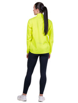 Ronhill Women's Core Jacket in Fluo Zest - back three-quarter, worn