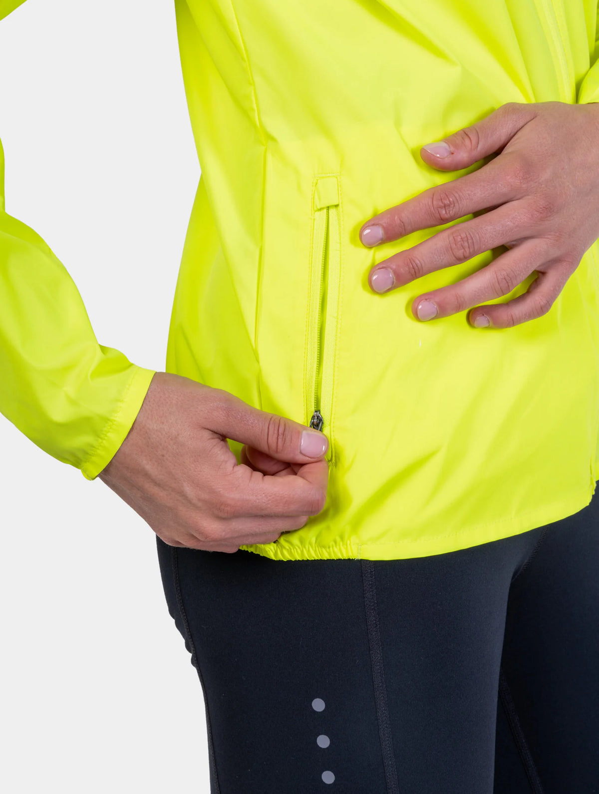 Ronhill Women's Core Jacket in Fluo Zest - zip pocket detail