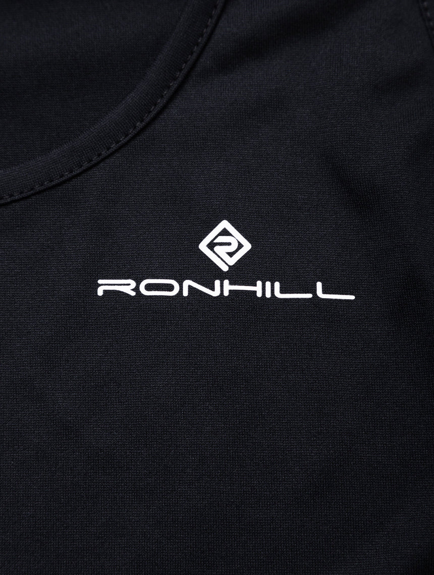 Ronhill Women's Core S/S Tee in Black/Bright White - brand logo detail