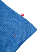Ronhill Women's Tech Winter Primaloft Hoodie in Lumiere/Sumac - fabric and brand tag, corner detail