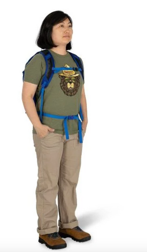 Osprey Sportlite 20 Backpack Outdoor Action - female model wearing - front