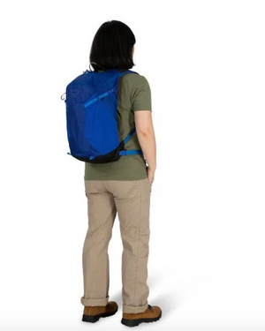 Osprey Sportlite 20 Backpack Outdoor Action - female model wearing - back angled