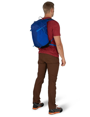 Osprey Sportlite 20 Backpack Outdoor Action - male model wearing - back angled