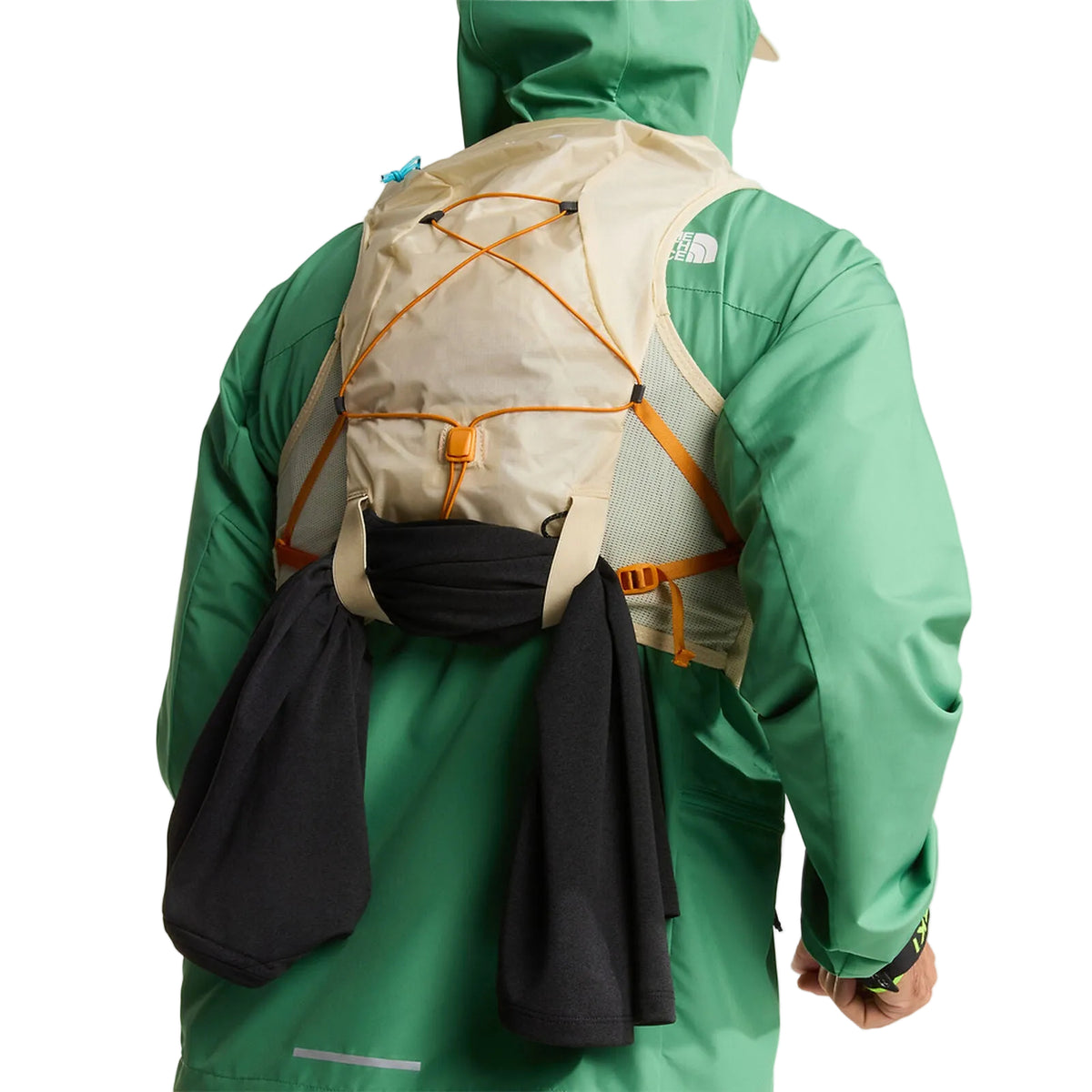 The North Face Sunriser Run Vest 8 in Desert Stone/Rust Orange - worn, back, chest strap detail