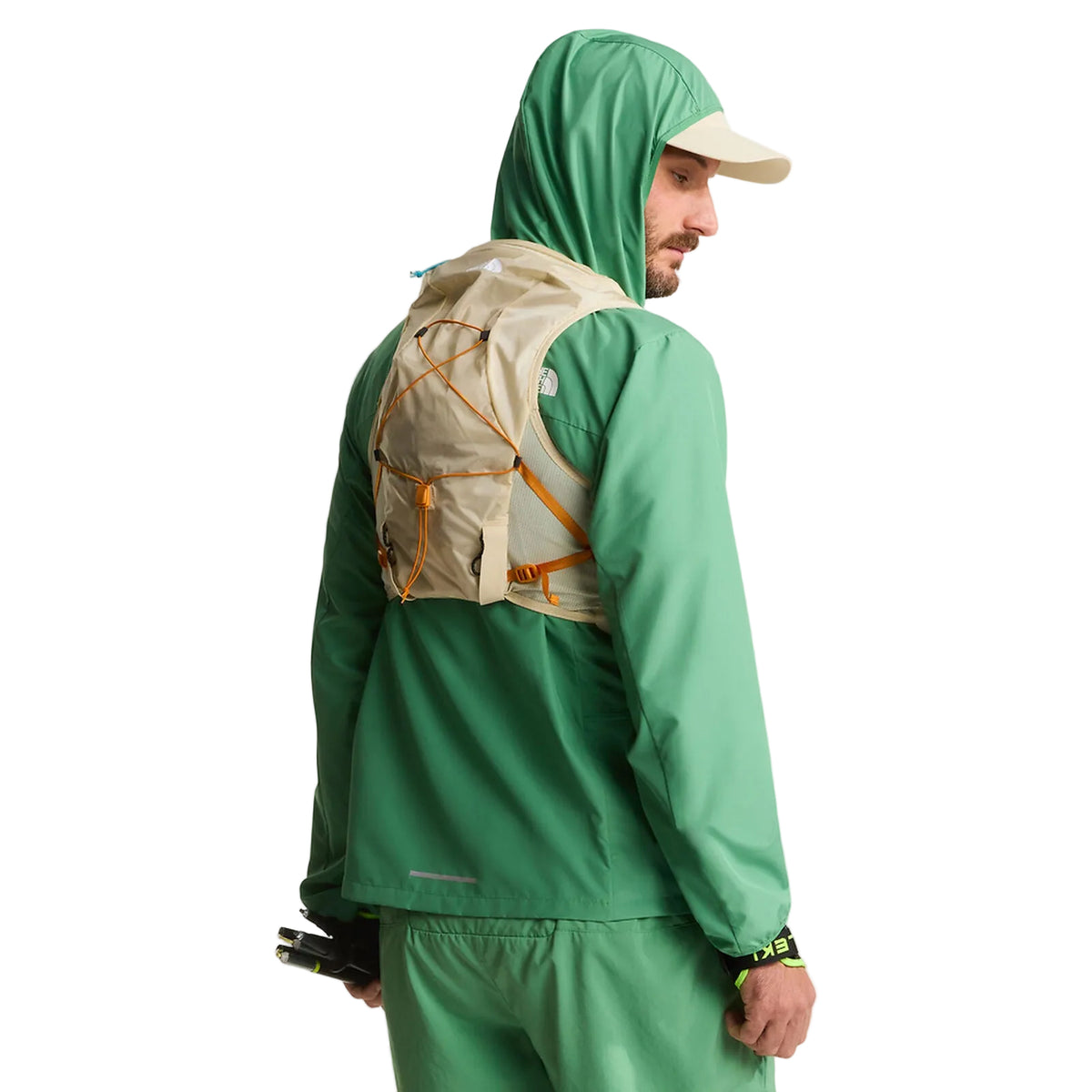 The North Face Sunriser Run Vest 8 in Desert Stone/Rust Orange - worn, back three-quarter
