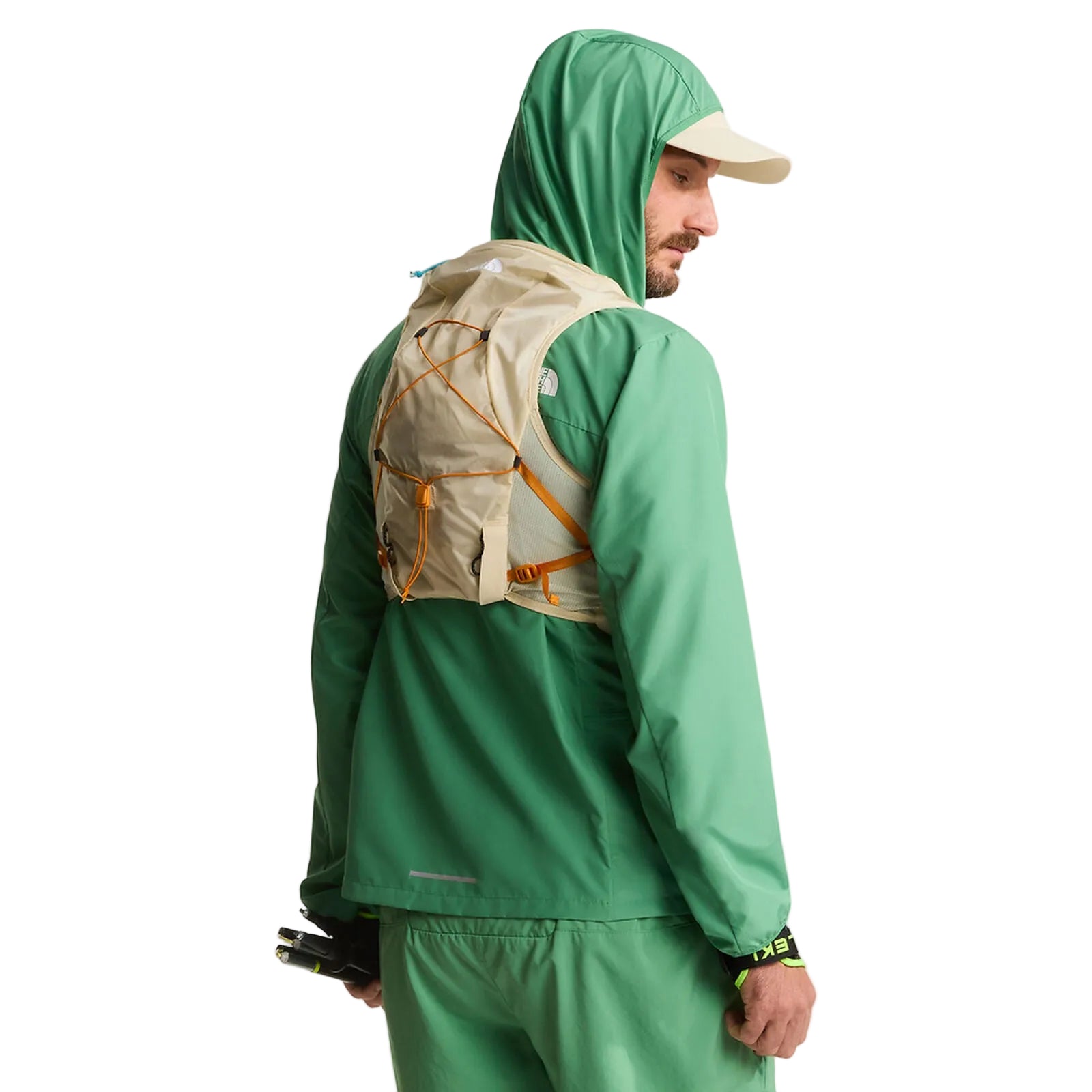 The North Face Sunriser Run Vest 8 in Desert Stone/Rust Orange - worn, back three-quarter