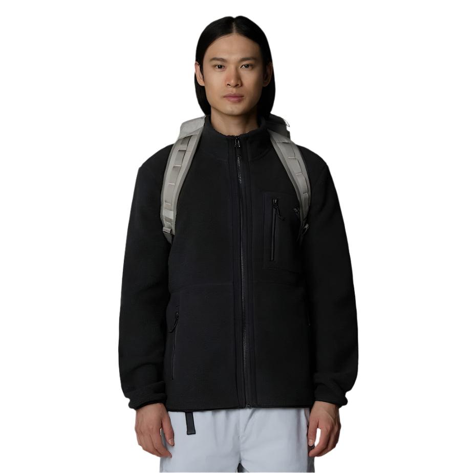 The North Face Base Camp Voyager Duffel 32L Soapstone - worn as backpack showing convertible carrying system