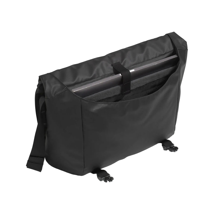The North Face Base Camp Voyager Messenger Bag with open compartment displaying padded laptop sleeve and internal organisation