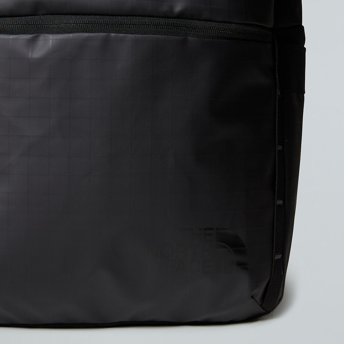 Close-up of The North Face Base Camp Voyager Roll Top Backpack roll-top closure mechanism for weather protection