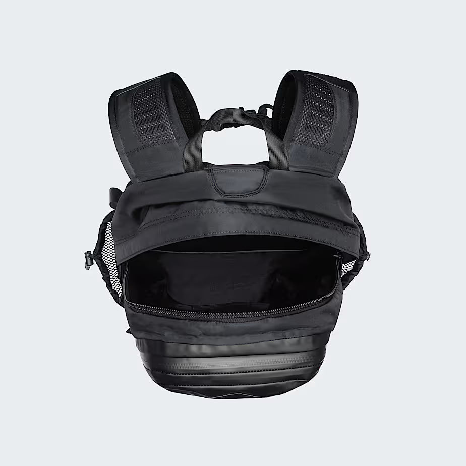 Interior view of The North Face Hot Shot Base Camp Backpack showing fleece-lined 15-inch laptop sleeve
