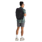 Side view of The North Face Kaban LTE Backpack displaying water bottle pockets and compression straps