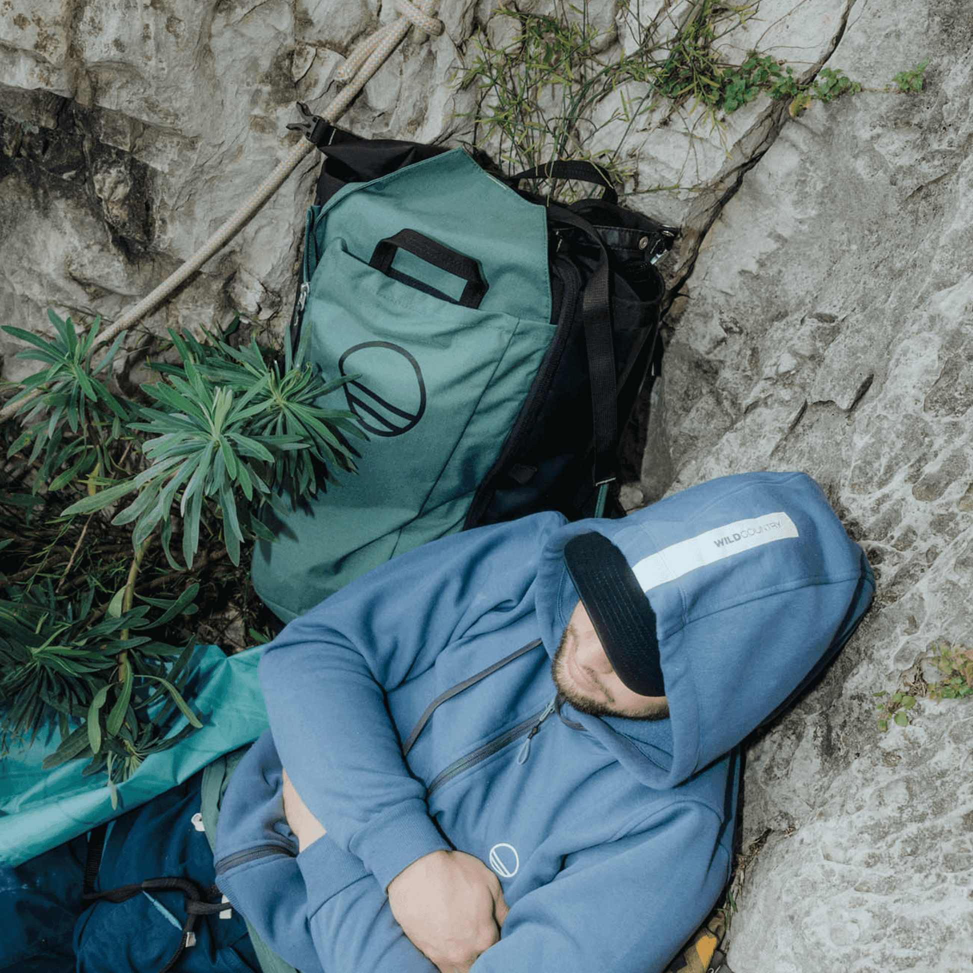 Wild Country Climbing Crag Hauler 40 Backpack Outdoor Action Black/Marsh - model laying next to pack