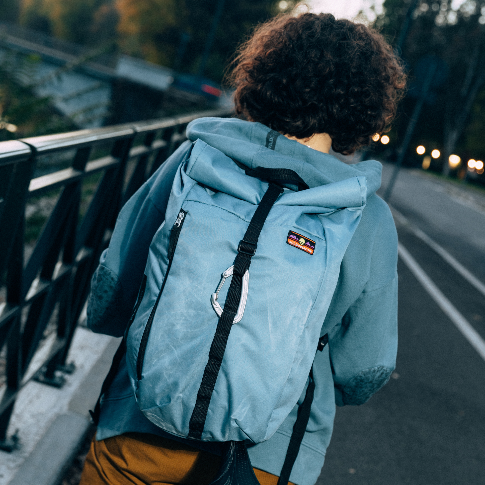 Wild Country Climbing Flow Back Pack - person carrying pack on street