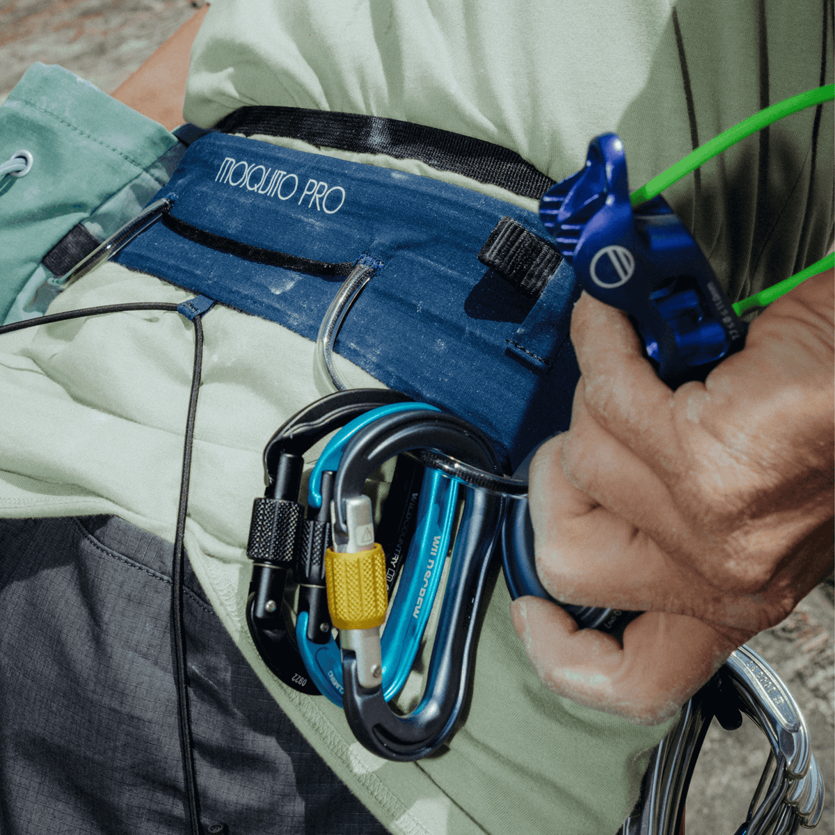 Wild Country Climbing Mosquito Pro Harness Navy - Close up of Carabiner Attachment on Model